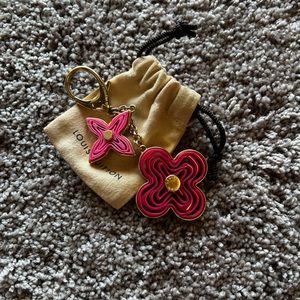 Authentic Louis Vuitton bag charm/key ring in great gently used condition.